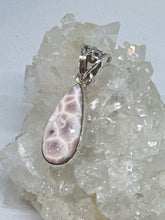 Pretty little teardrop shaped pink Larimar Pendant