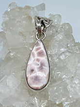 Pretty little teardrop shaped pink Larimar Pendant