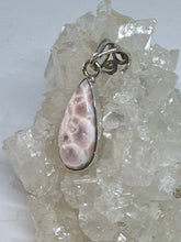Pretty little teardrop shaped pink Larimar Pendant